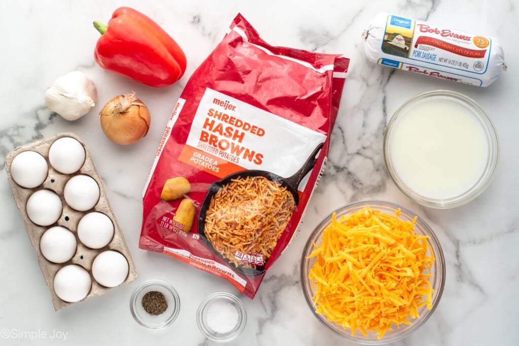 Overhead view of ingredients on countertop for Hashbrown Breakfast Casserole recipe - 6