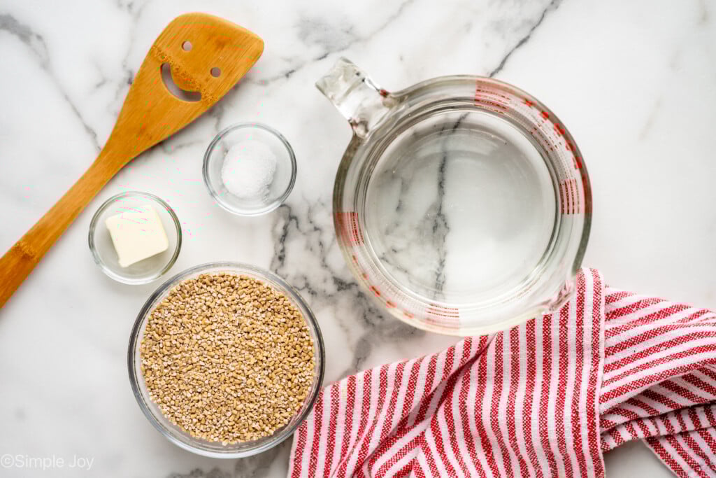 Overhead view of ingredients on countertop for Instant Pot Steel Cut Oats recipe. - 5