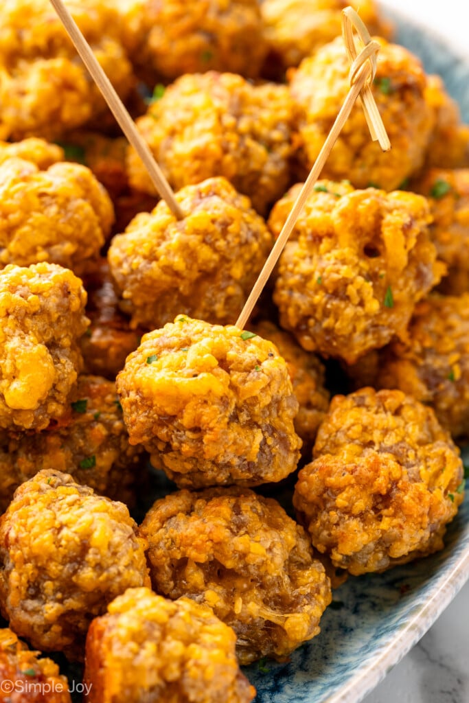 Platter of Sausage Balls, a few with toothpicks for serving. - 4