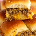 Stack of Cheeseburger Sliders garnished with sesame seeds - 13