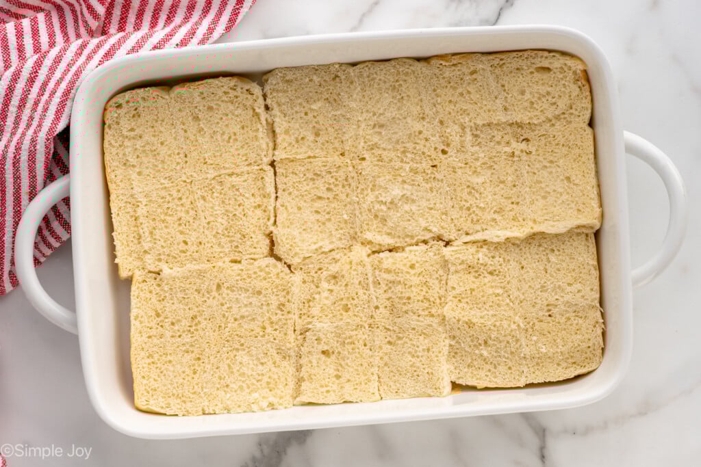 Overhead view of buns in baking dish for Cheeseburger Sliders recipe - 7