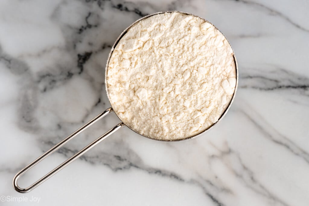 Overhead view of a measuring cup of Self Rising Flour - 7