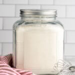 Canister of Self Rising Flour with whisk beside - 9