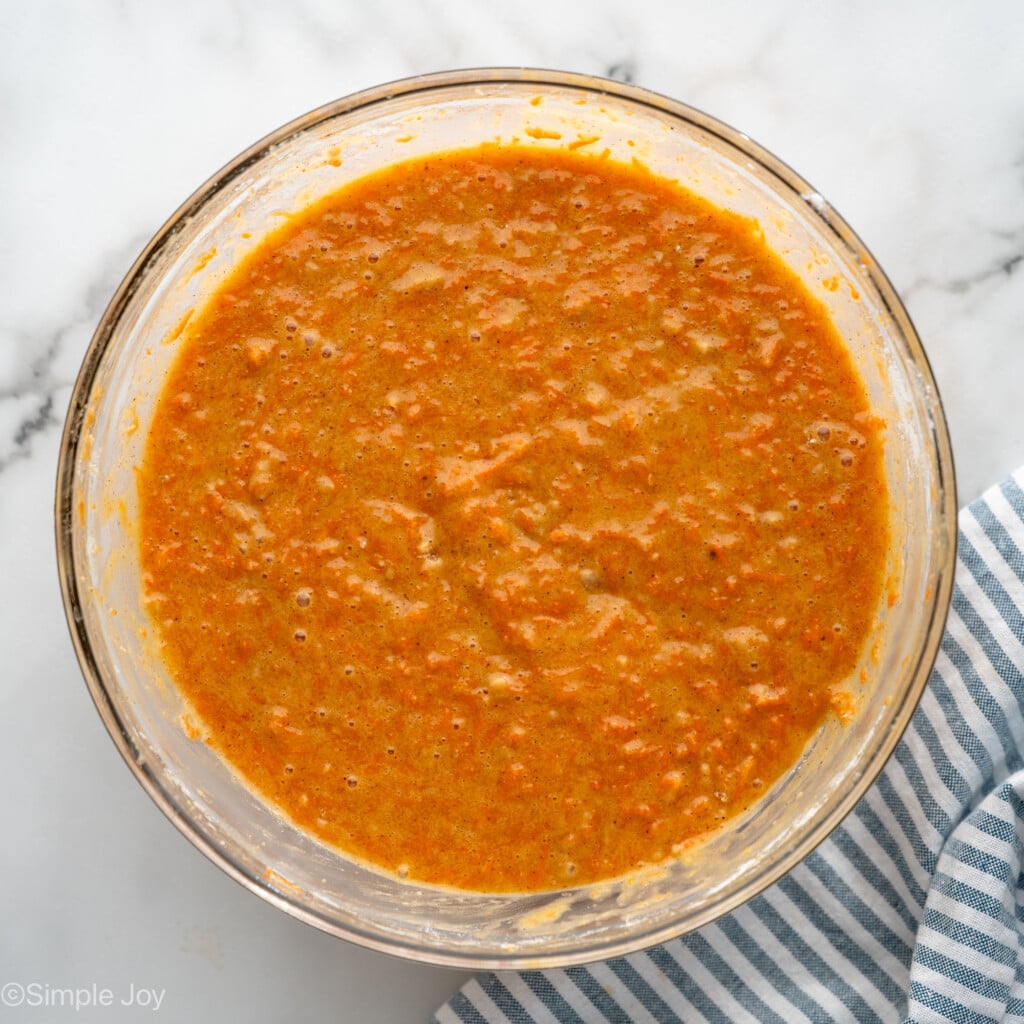 Overhead view of mixing bowl of batter for Carrot Cake Cupcakes recipe