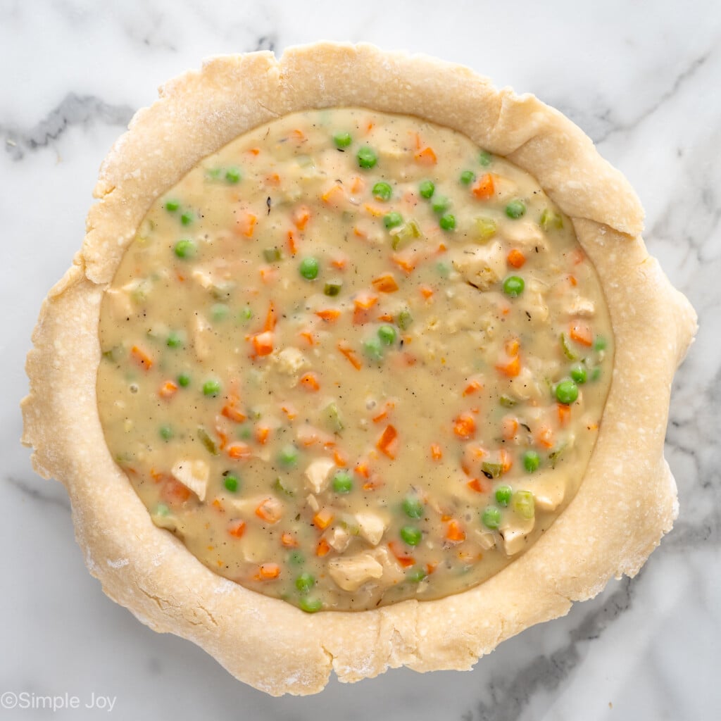 Overhead view of filling in crust for Chicken Pot Pie recipe