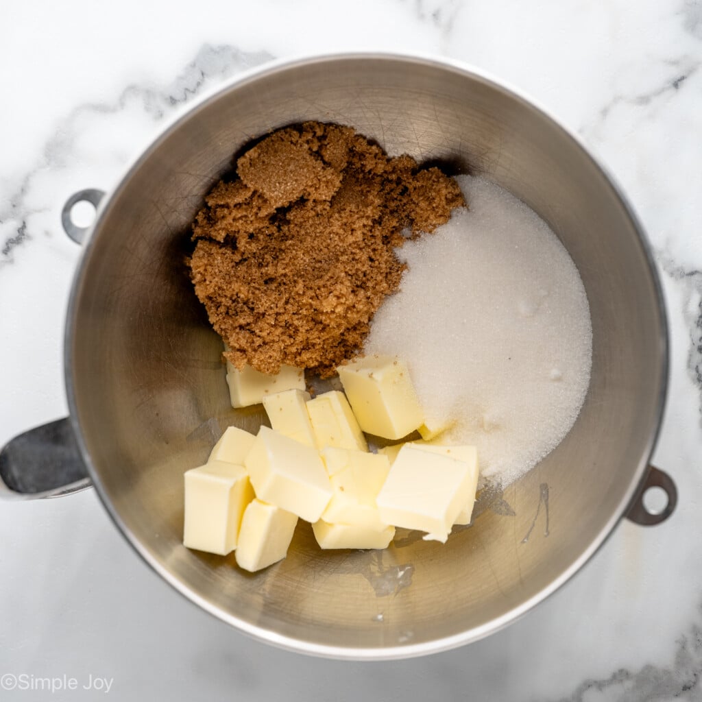 Overhead view of a mixing bowl of ingredients for Oatmeal Raisin Cookies recipe before mixing