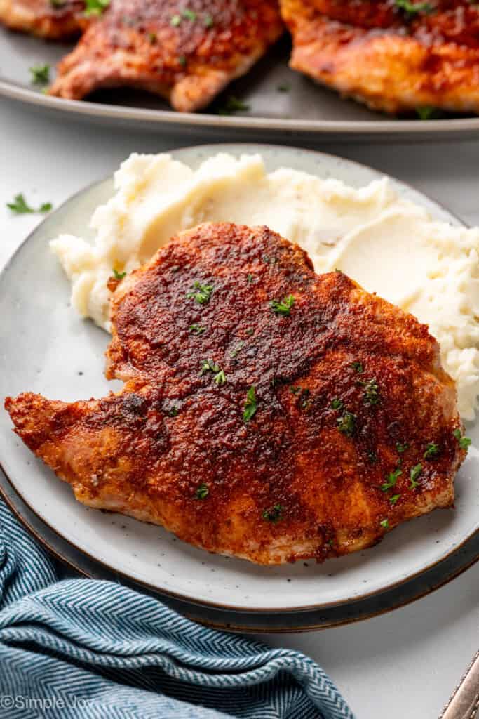 Plate of Baked Pork Chops and mashed potatoes