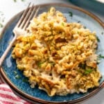 Plate of Chicken and Stuffing Casserole with fork