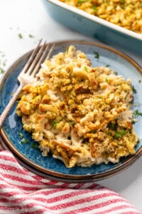 Plate of Chicken and Stuffing Casserole with fork