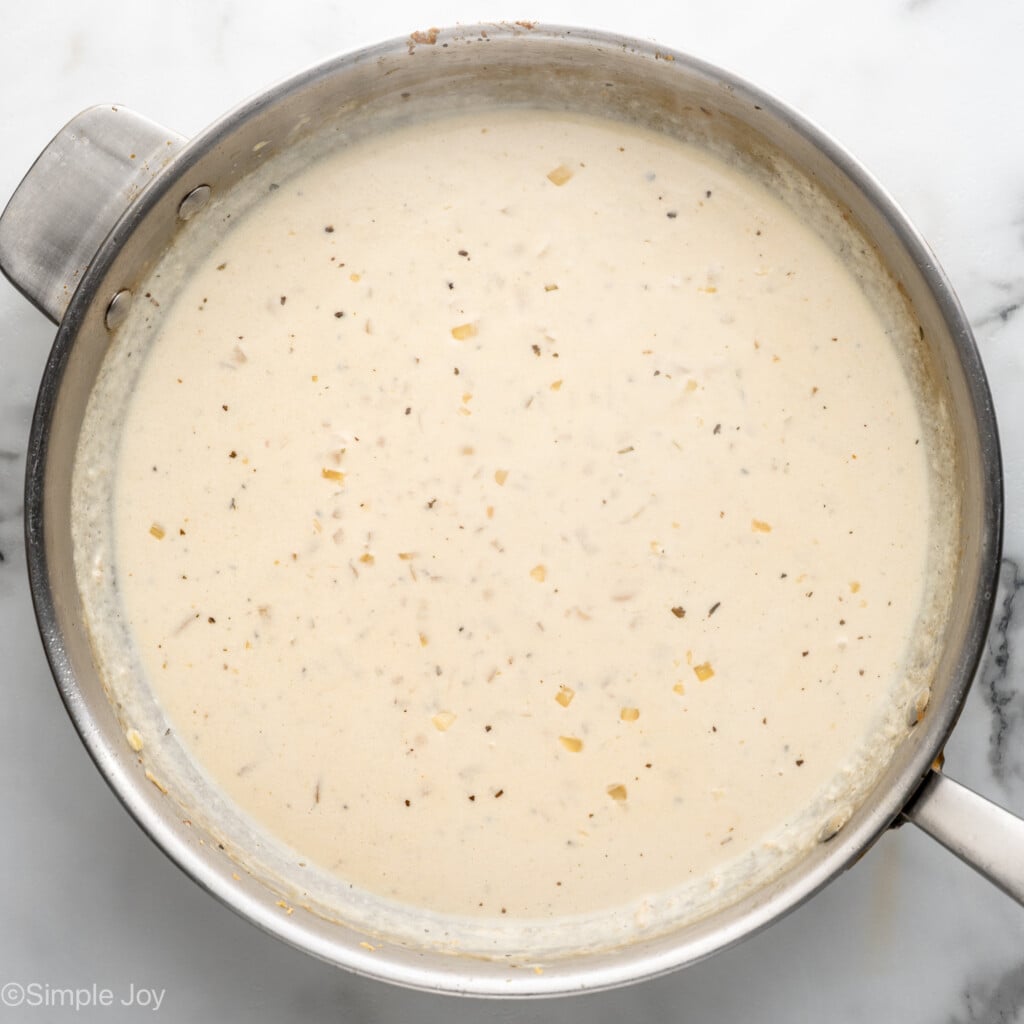 Overhead view of a skillet of sauce for Chicken Penne Pasta recipe