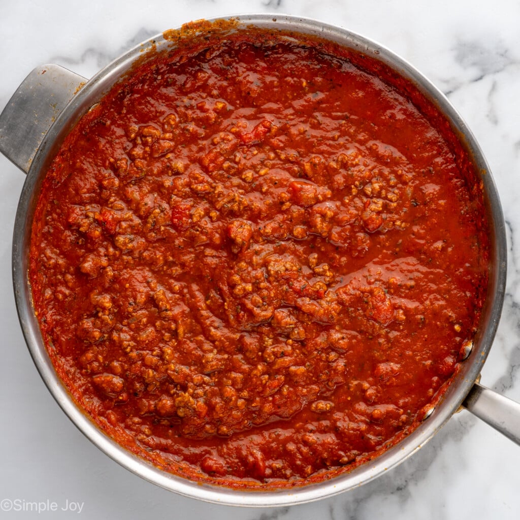 Overhead view of saucepan of meat sauce for Lasagna Roll Ups recipe