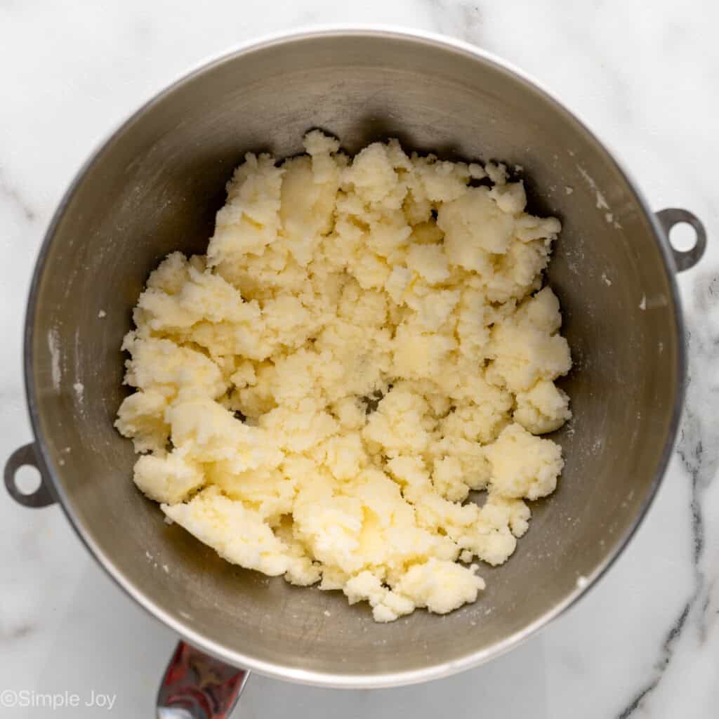 Overhead view of a mixing bowl of ingredients combined for Lemon Sugar Cookie Bars recipe
