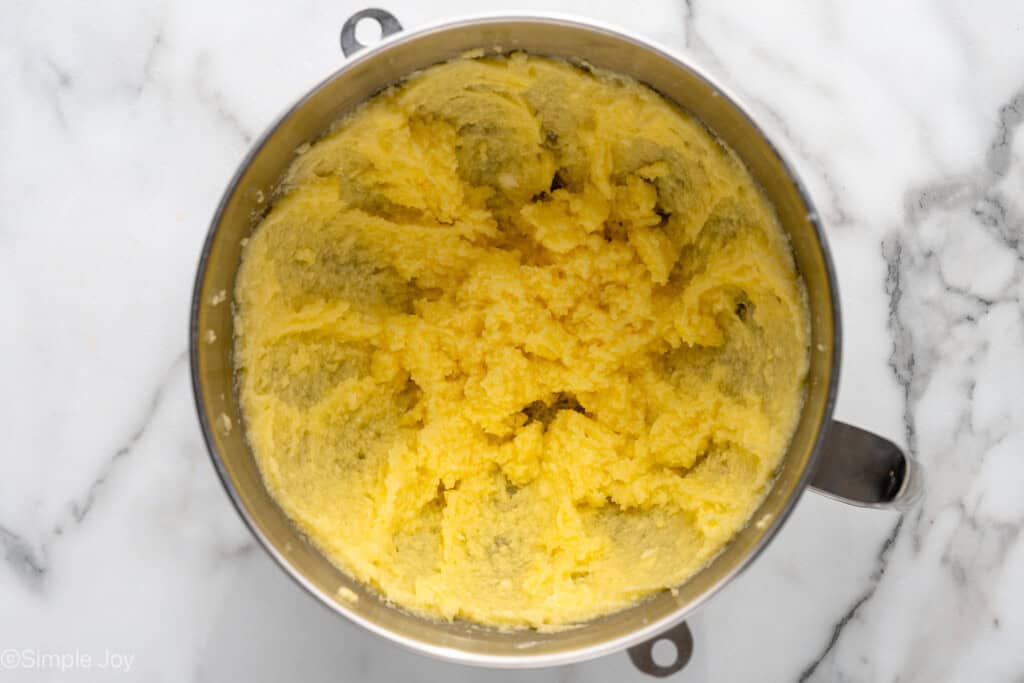 Overhead view of a mixing bowl of ingredients combined for Lemon Sugar Cookie Bars recipe