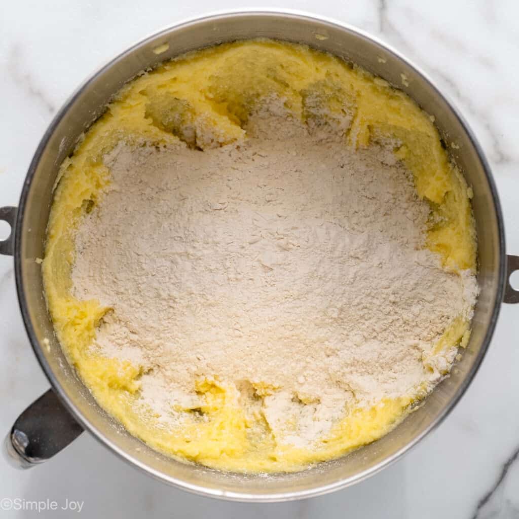 Overhead view of a mixing bowl of ingredients for Lemon Sugar Cookie Bars recipe