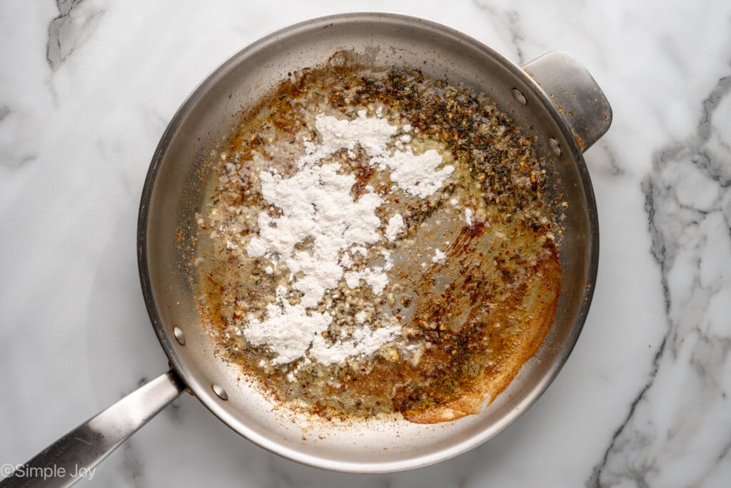 Overhead of skillet of Marry Me Chicken ingredients