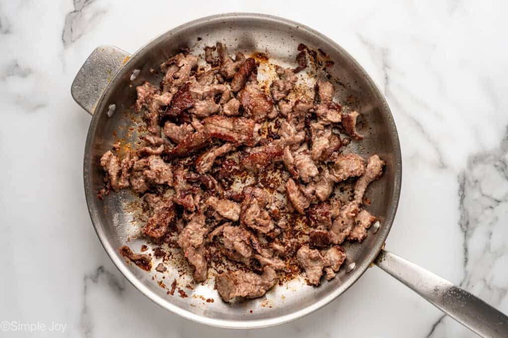 overhead of skillet of beef to make Mongolian Beef