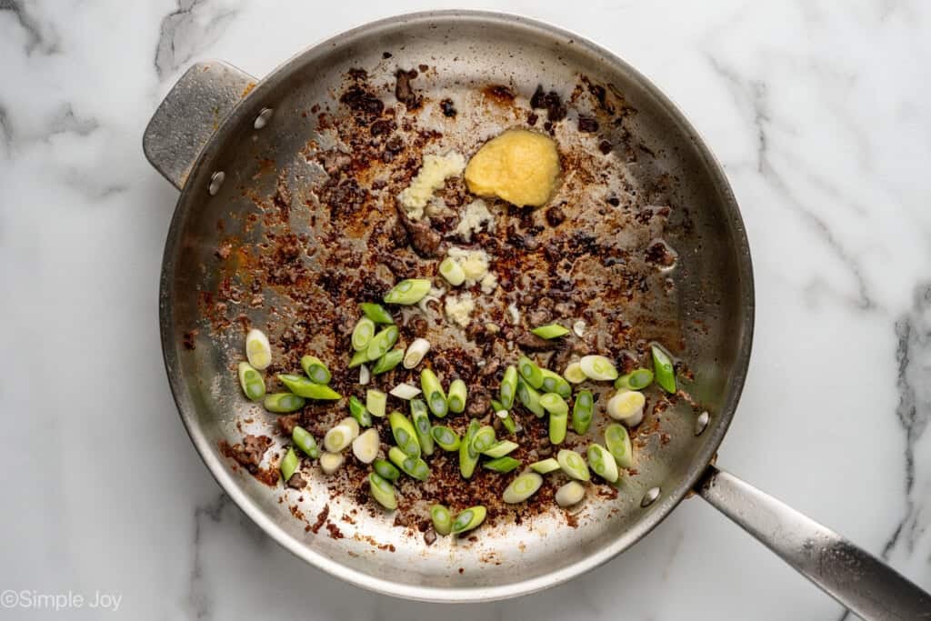 overhead of skillet of ingredients to make Mongolian Beef