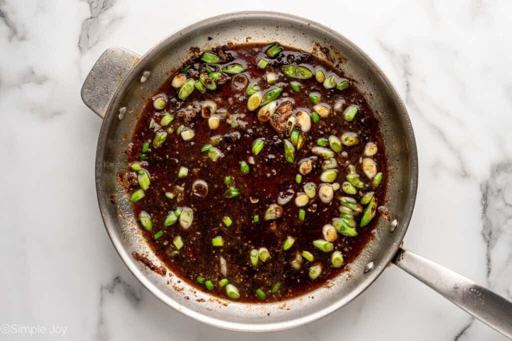 overhead of skillet of sauce ingredients to make Mongolian Beef