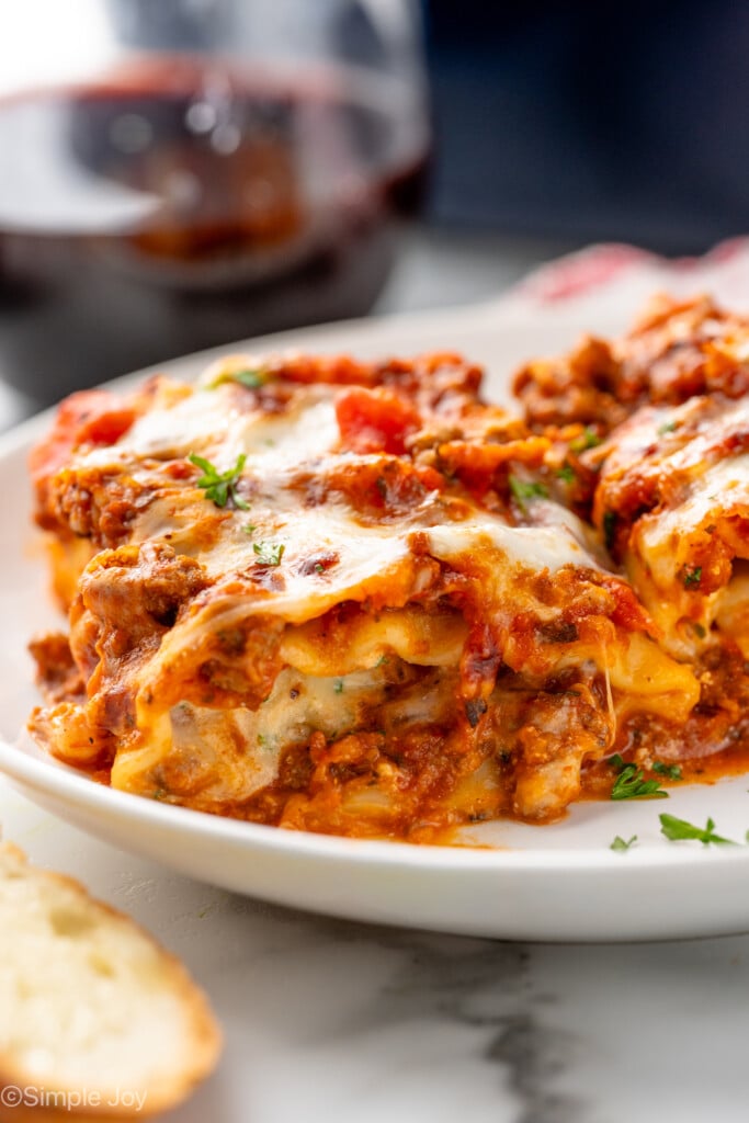 Plate of Lasagna Roll Ups topped with fresh parsley
