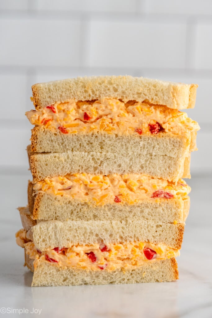 Stack of sandwiches made with Pimento Cheese recipe