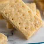 Pinterest graphic for Shortbread Cookies. Image shows close up of shortbread cookies. Says "shortbread cookies simplejoy.com"