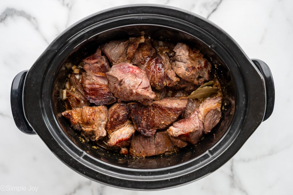 Overhead of beef in crockpot to make beef barbacoa