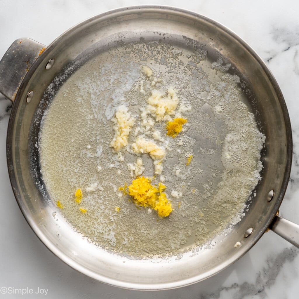 Overhead of lemon pasta ingredients in skillet