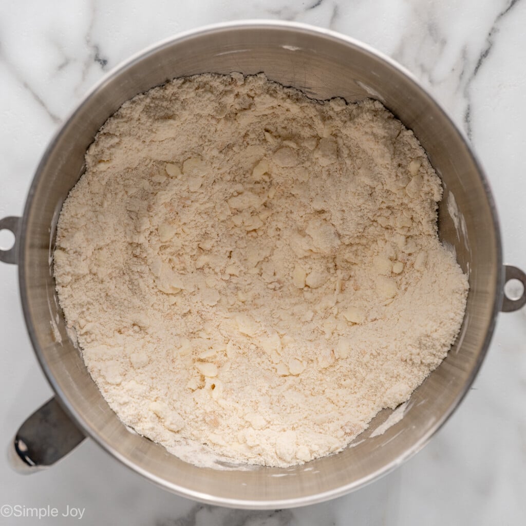 overhead of mixing bowl of short bread cookie recipe ingredients