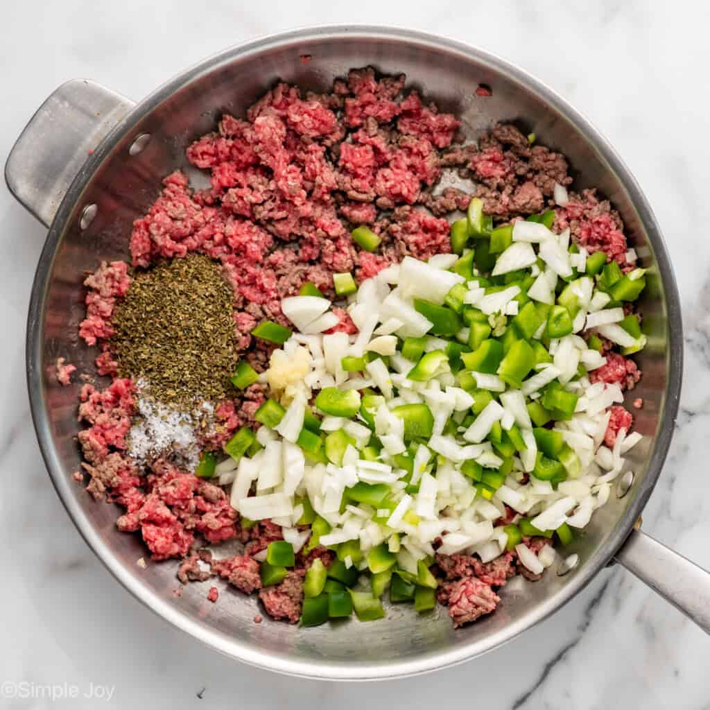 Overhead of skillet of American Chop Suey ingredients