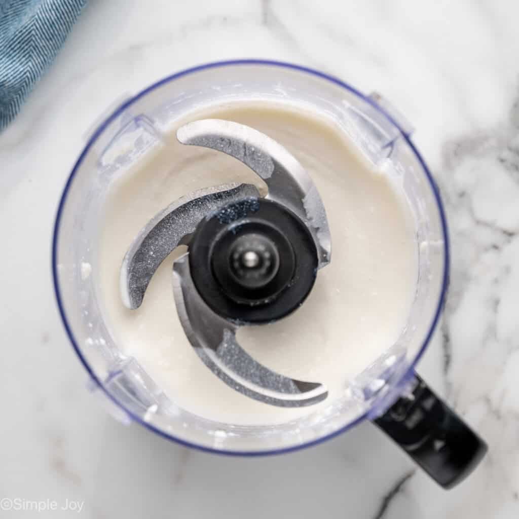 Overhead of food processor of cottage cheese to make Cottage Cheese Egg Salad
