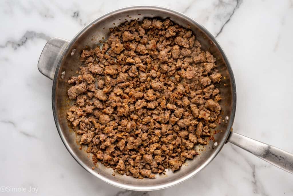 Overhead of skillet of browned hamburger to make Five Ingredient Baked Ziti recipe