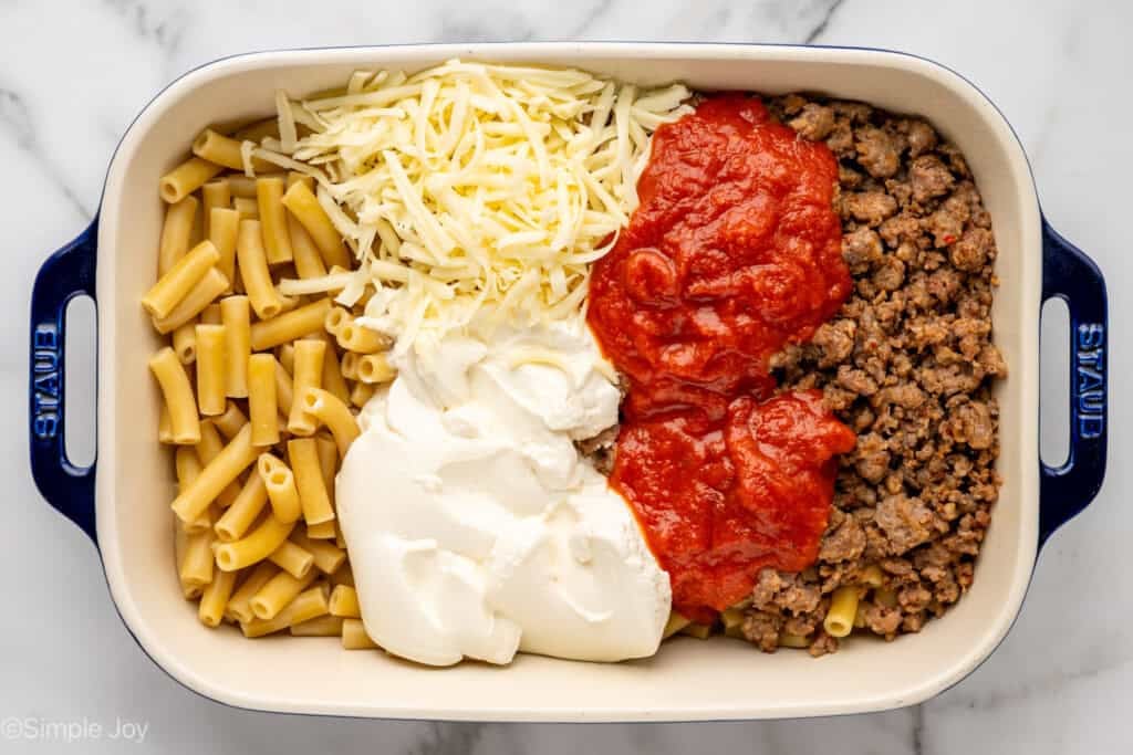 Overhead of baking dish of Five Ingredient Baked Ziti ingredients