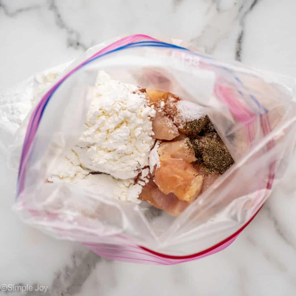 Overhead of plastic bag of Sweet and Sour Chicken ingredients
