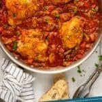 Pinterest graphic for Chicken Cacciatore. Image shows overhead of skillet of Chicken Cacciatore. Says "tried and tested Chicken Cacciatore simplejoy.com"
