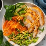 Overhead of bowl of Honey Sriracha Chicken Bowl ingredients