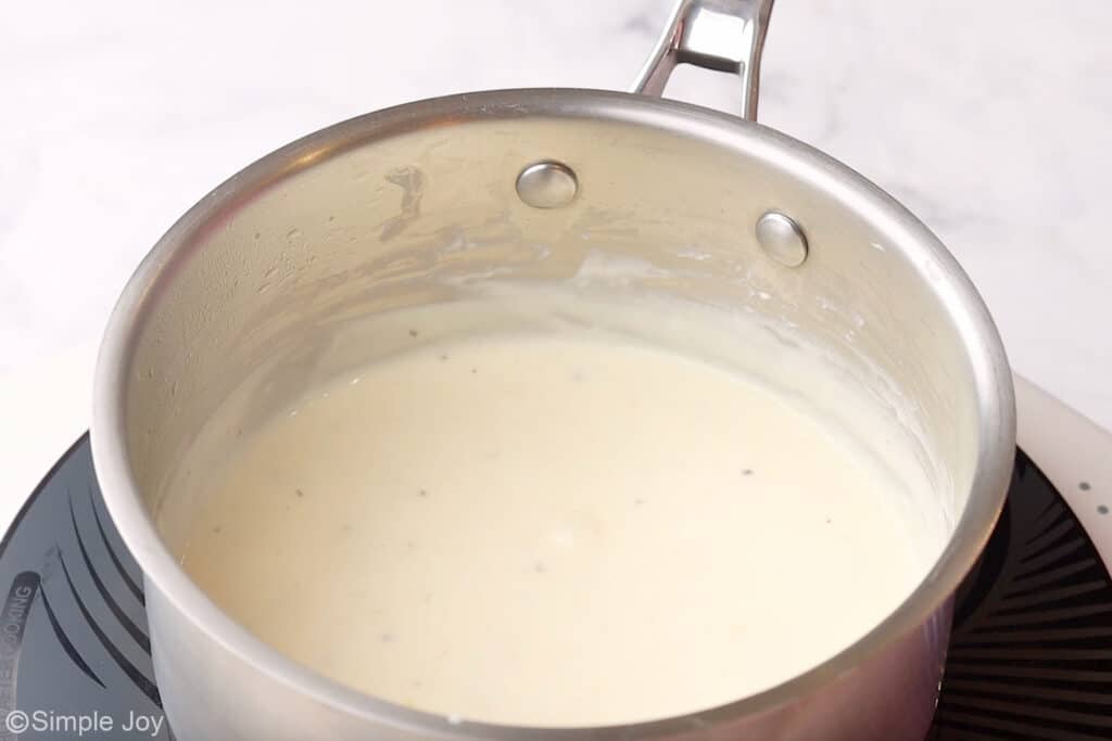 Saucepan of chicken cordon bleu sauce ingredients