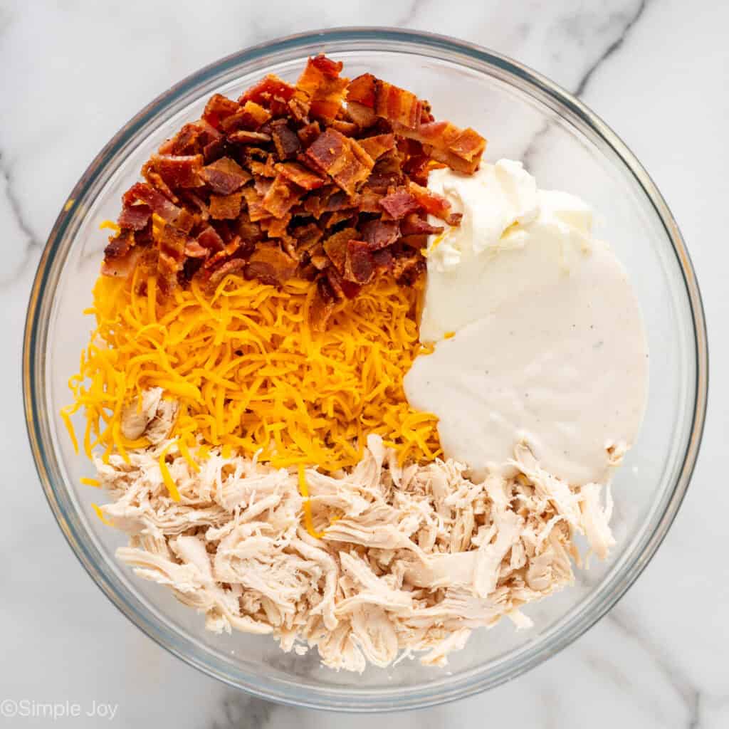 Overhead of bowl of crack chicken wrap ingredients