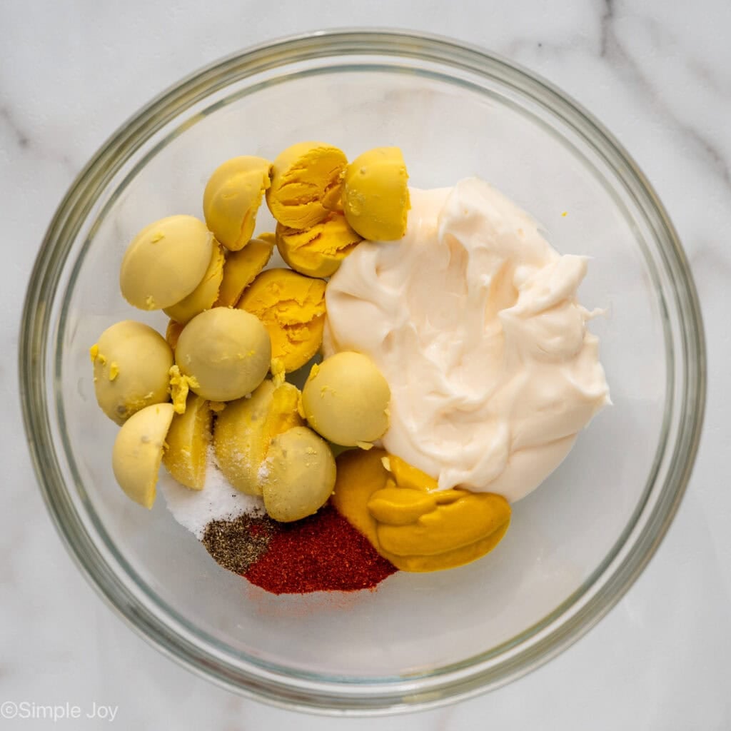 Overhead of bowl of Deviled Egg Pasta Salad ingredients
