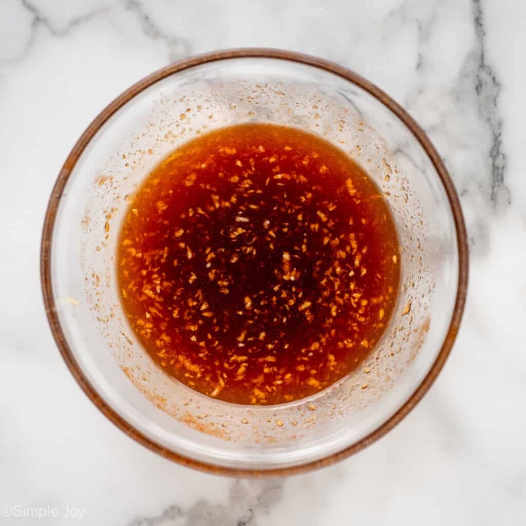 Overhead of bowl of Honey Sriracha Chicken Bowl ingredients