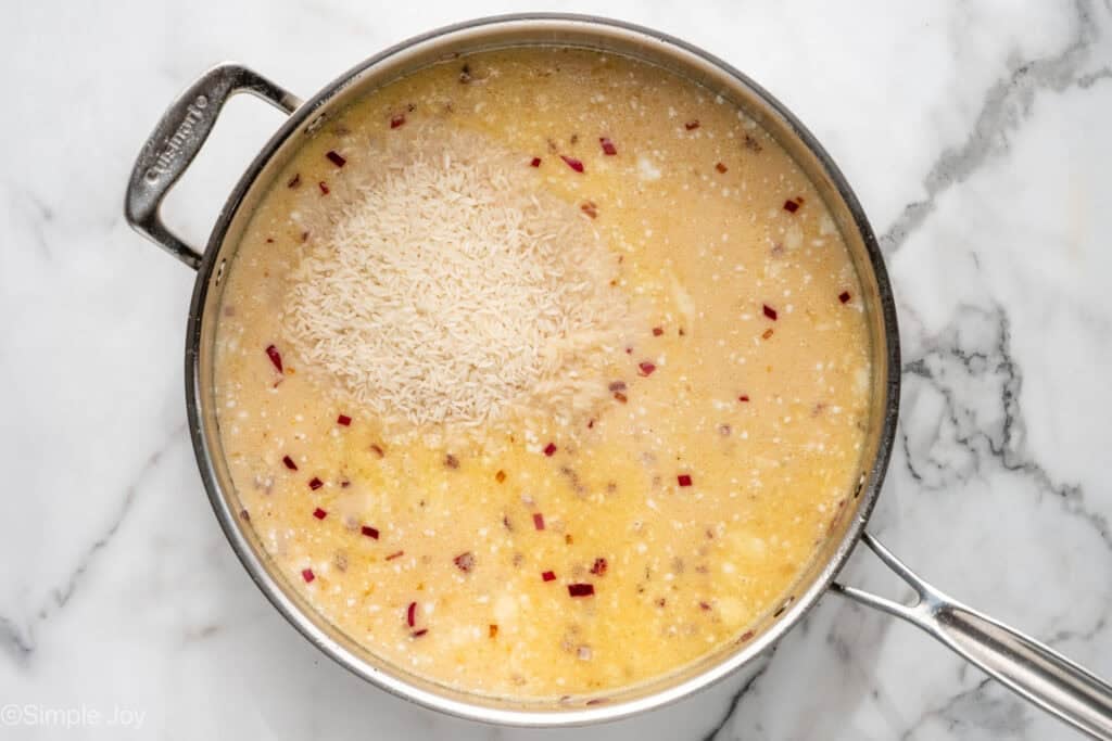 Overhead of skillet of One Pot Coconut Lime Chicken ingredients