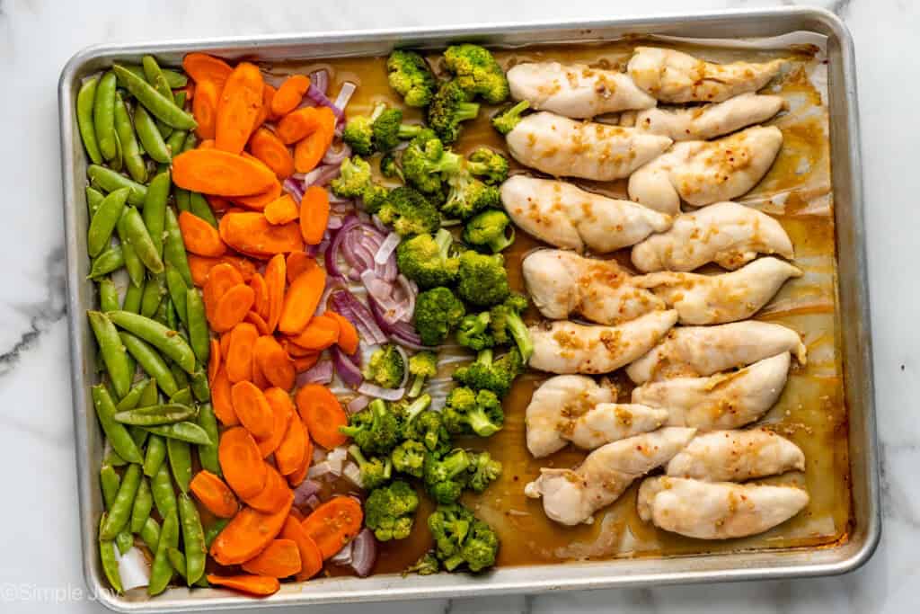 Overhead of baking sheet of Honey Garlic Chicken and Vegetables