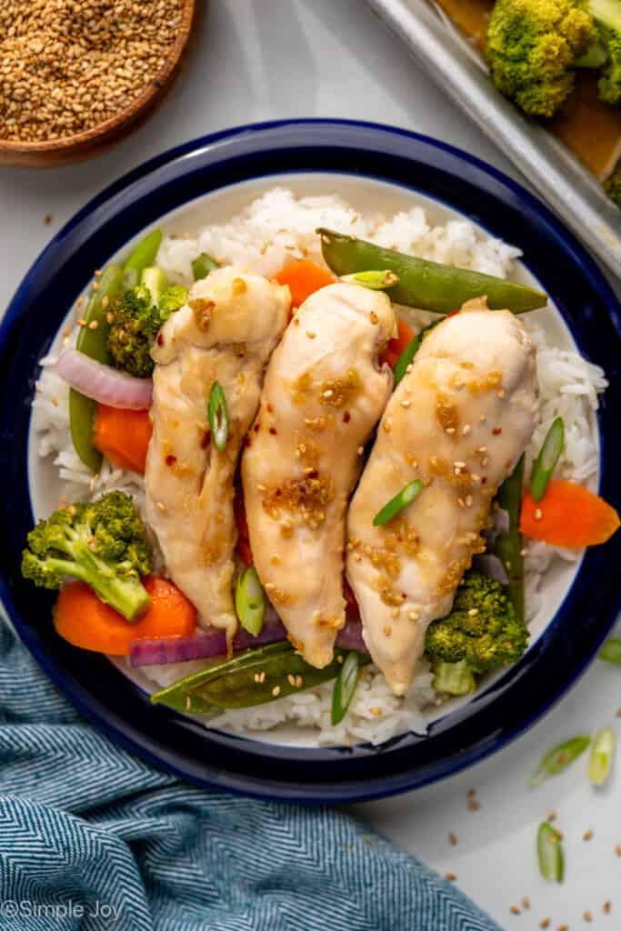 Overhead of plate of Honey Garlic Chicken and Vegetables over rice