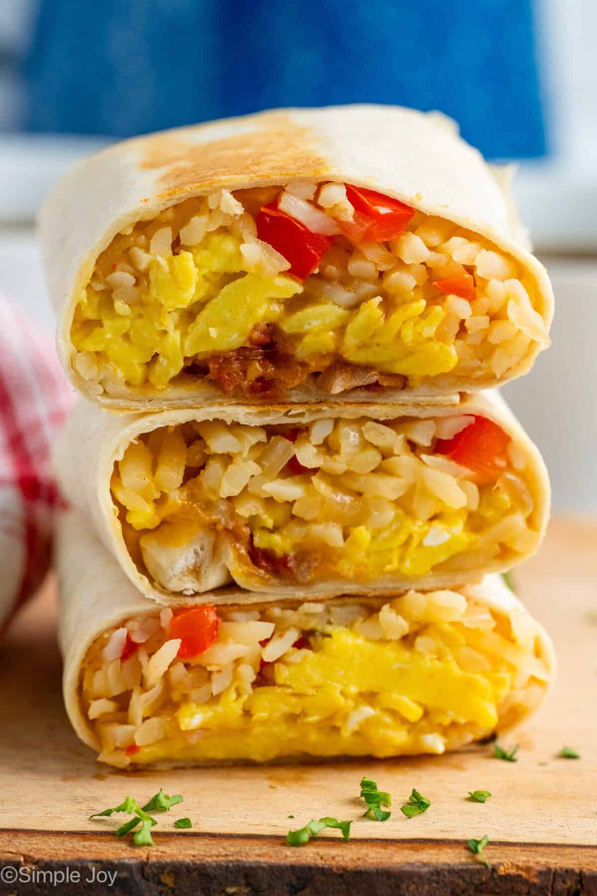 three Breakfast Burritos stacked on top of each other