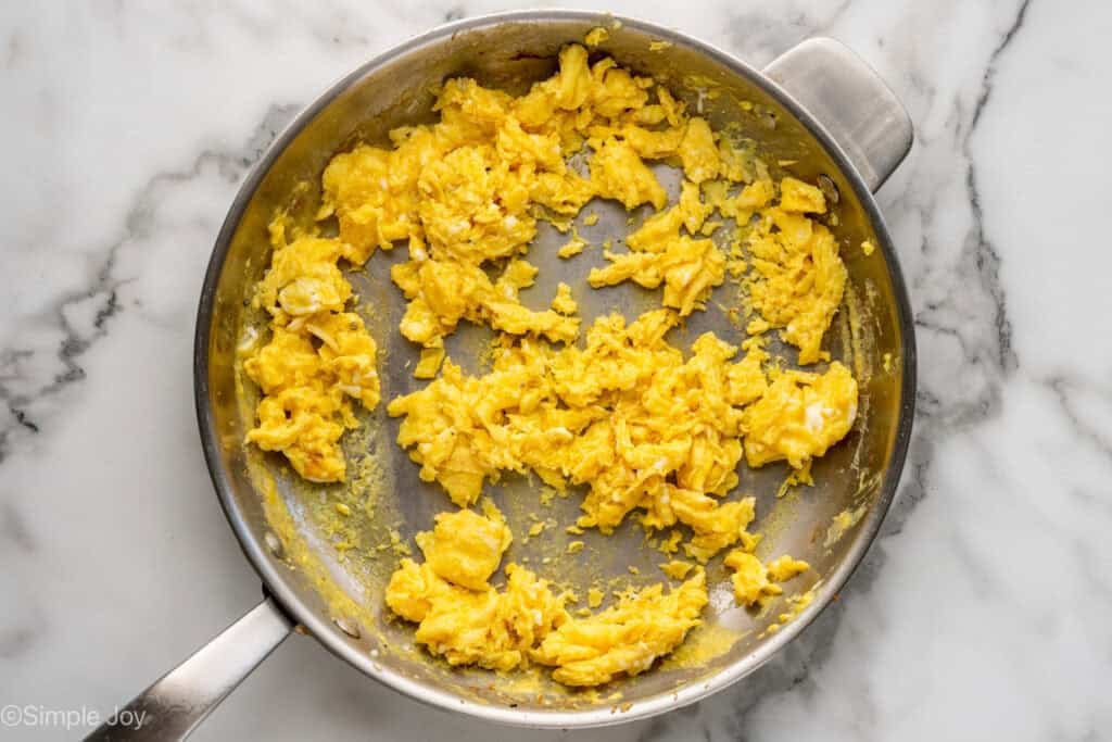 Overhead of skillet of scrambled eggs to make Breakfast Burritos