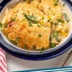 Pinterest graphic for chicken cobbler. Image shows chicken cobbler in a bowl. Says "chicken cobbler simplejoy.com"