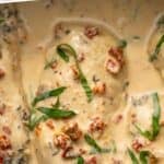 Pinterest graphic for Crockpot Marry Me Chicken. Says "slow cooker marry me chicken simplejoy.com" Image shows close up of marry me chicken garnished with basil leaves