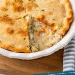 Pinterest graphic for easy chicken pot pie. Image shows a pie plate of easy chicken pot pie. Says "super easy chicken pot pie simplejoy.com"