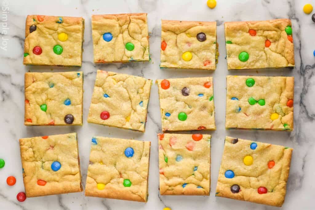 overhead view of m&m cookie bars cut up