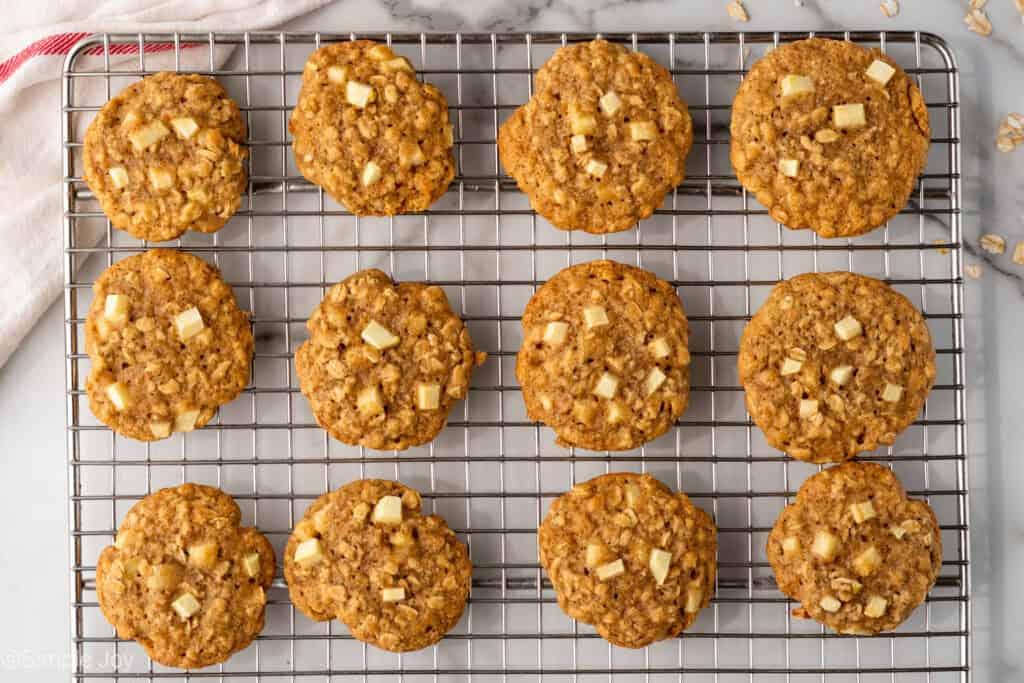 Overhead of apple cookies on a wire cooling rack