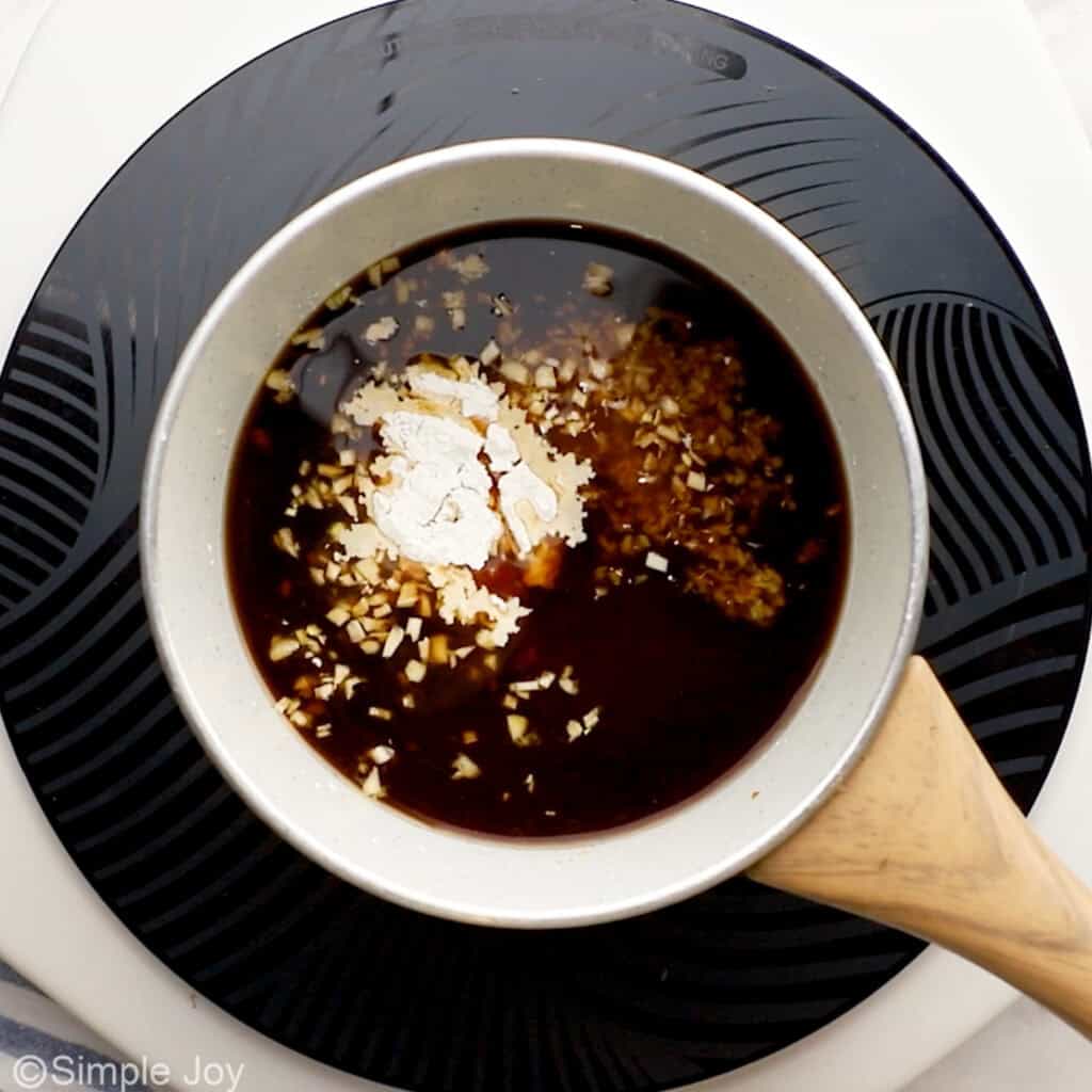 Overhead of saucepan of teriyaki sauce ingredients to make teriyaki chicken recipe